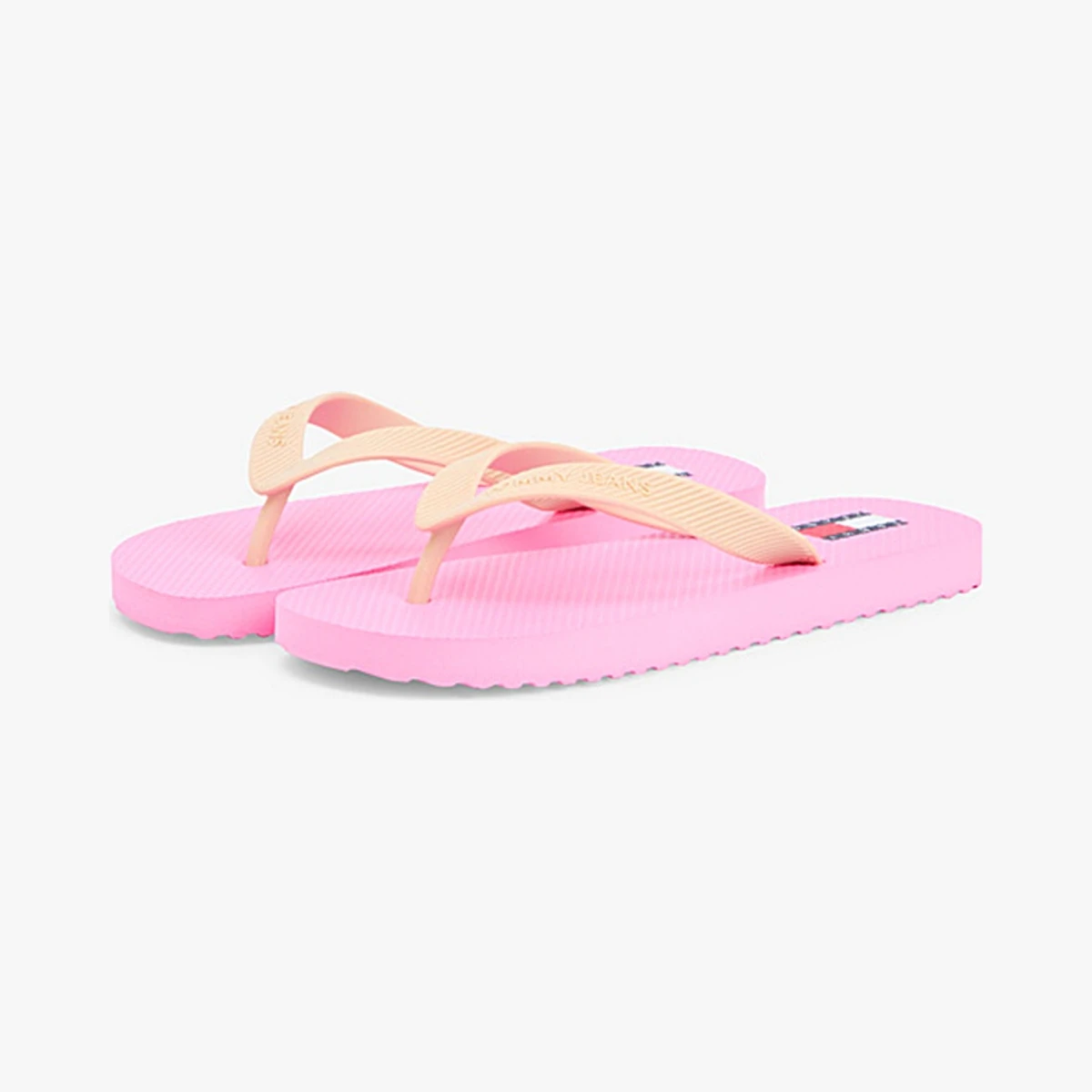 Tommy Jeans Fine Cleat Embossed Logo Flip Flops in Pink