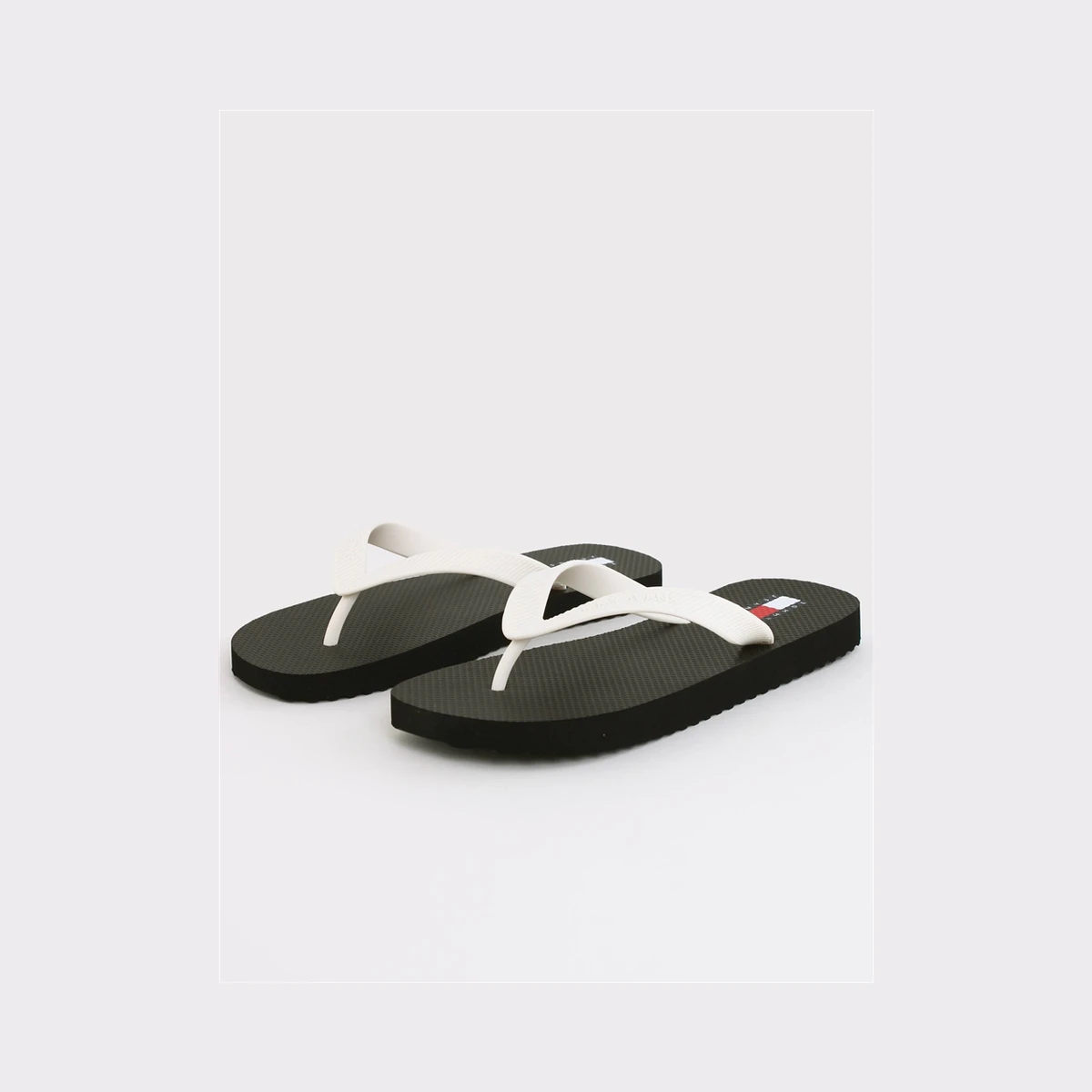 Tommy Jeans Fine Cleat Embossed Logo Flip Flops in Black