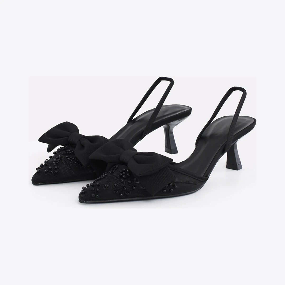 Truffle Mesh Bow Slingback Heels in Black
